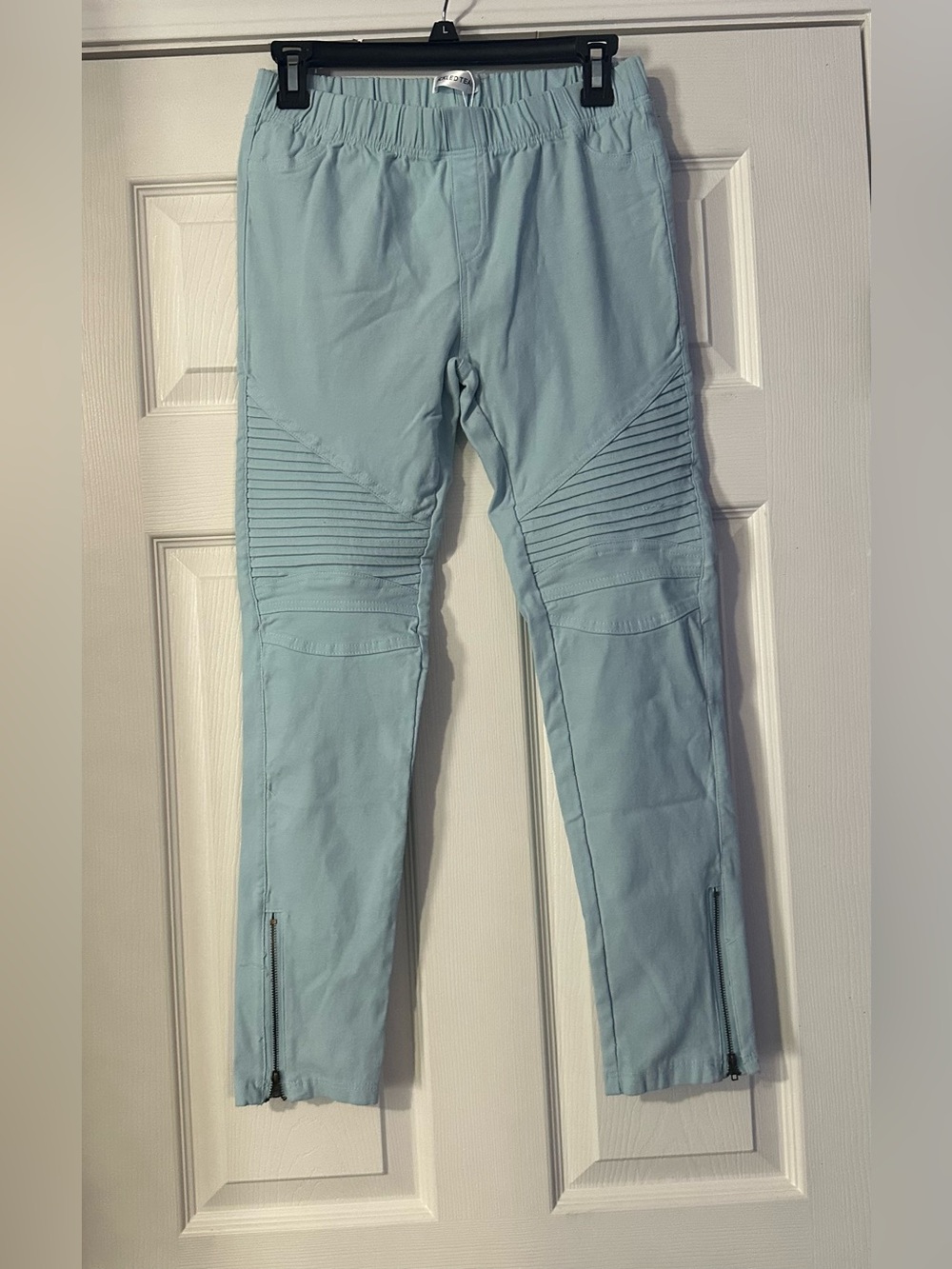 Tickled Teal Light Blue Stretch Moto Pants are a size Large.